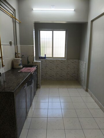 Kitchen in 1 BHK Apartment at Evershine Tulip CHS Ltd, Vasai East – for Sale