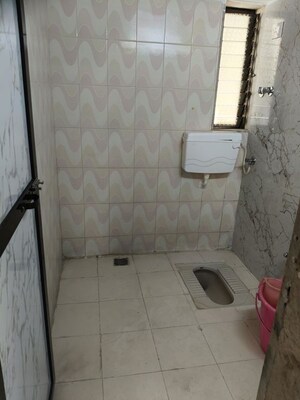 Bathroom in 1 BHK Apartment at Evershine Tulip CHS Ltd, Vasai East – for Sale