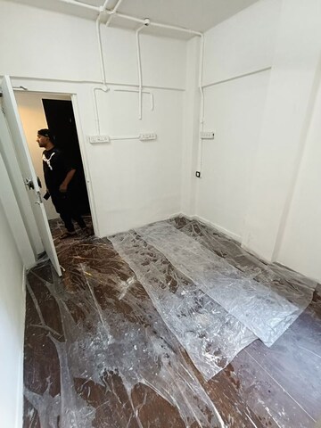 Kitchen in 2 BHK Apartment at Gulmohar Garden CHS, Versova – for Rent