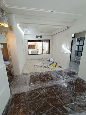 Bedroom in 2 BHK Apartment at Gulmohar Garden CHS, Versova – for Rent