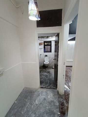 Bathroom in 2 BHK Apartment at Gulmohar Garden CHS, Versova – for Rent