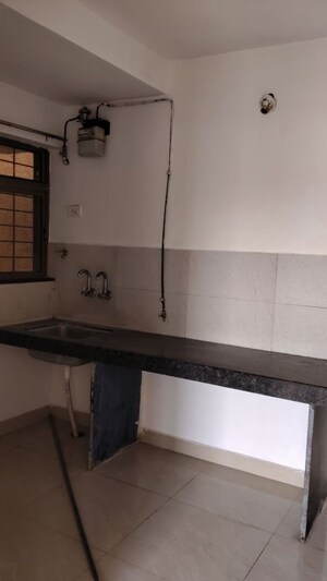 Kitchen in 1 BHK Apartment at Kanchan Onyx, Pisoli – for Rent