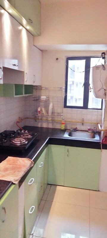 Kitchen in 2 BHK Apartment at River Heights Plaza, Raj Nagar Extension – for Rent