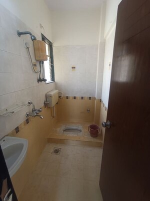 Bathroom in 2 BHK Apartment at Bhoomi Park II, Malad West – for Rent