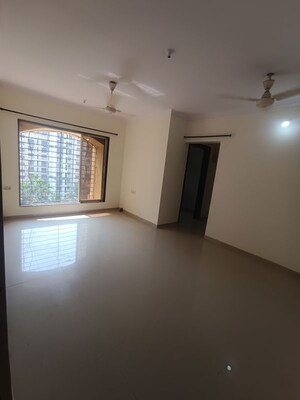 Living Room in 2 BHK Apartment at Bhoomi Park II, Malad West – for Rent