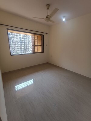 Bedroom in 2 BHK Apartment at Bhoomi Park II, Malad West – for Rent