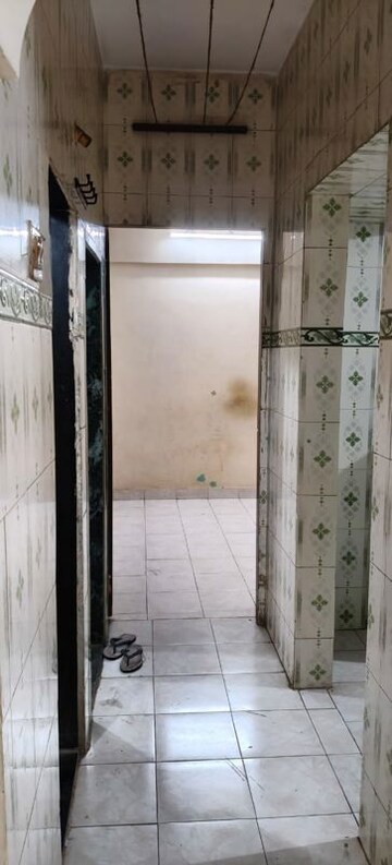 Building Lobby in 1 BHK Apartment at Shelter CHS, Nerul – for Rent