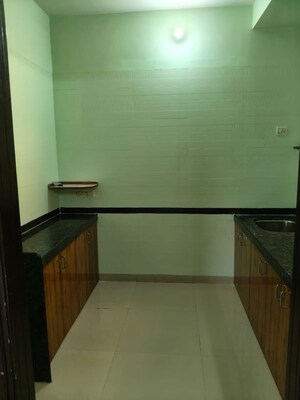 Kitchen in 2.5 BHK Apartment at Sai Sthan CHS, Nerul – for Rent