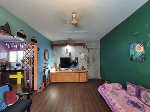 Living Room in 2.5 BHK Apartment at Rambaug Colony – for Sale