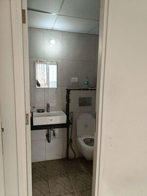 Bathroom in 3 BHK Apartment at Godrej Hillside, Mahalunge – for Rent