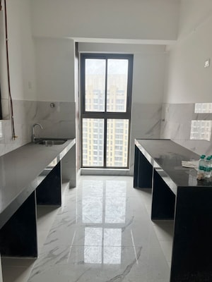 Kitchen in 2 BHK Apartment at Raymond Ten X Habitat, Swastik Garden – for Sale