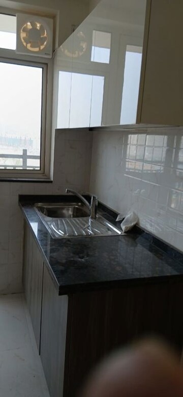 Kitchen in 3 BHK Apartment at Microtek Greenburg, Sector 86 – for Sale