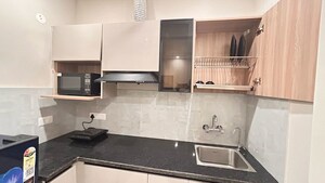 Kitchen in 1 BHK Apartment at DLF Atria, Dlf Phase ii – for Rent