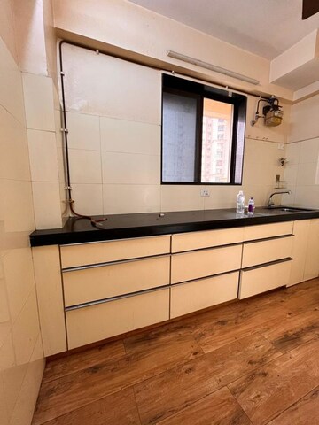 Kitchen in 2 BHK Apartment at Hiranandani Gardens Kingston, Powai – for Rent