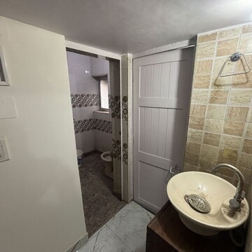 Bathroom in 5 BHK Apartment at Vikas Puri – for Sale