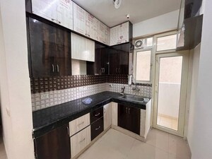 Kitchen in 2 BHK Apartment at Galaxy North Avenue ll, Gaur City 2 – for Rent