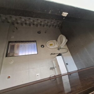 Bathroom in 1 BHK Apartment at Vihang Valley Phase 3, Kasarvadavali – for Sale