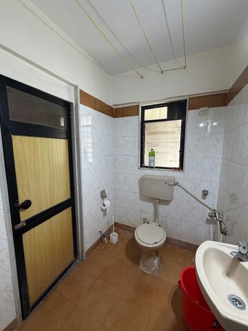 Bathroom in 3 BHK Apartment at Riddhi Tower, Malad East – for Rent