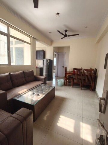 Living Room in 2 BHK Apartment at Gaurs Valerio, Ahinsa Khand 2 – for Rent