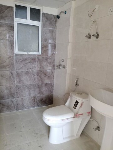 Bathroom in 2 BHK Apartment at Mittal Rajnagar Residency, Raj Nagar Extension – for Sale