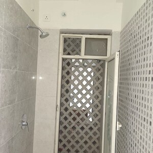 Bathroom in 2 BHK Apartment at Omkar Signet, Malad East – for Rent