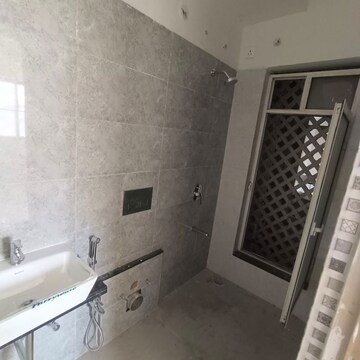 Bathroom in 1 BHK Apartment at Omkar Signet, Malad East – for Rent