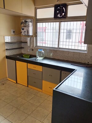 Kitchen in 2 BHK Apartment at Patil Raghukul Nagari CHS, Bopodi – for Sale