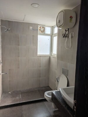 Bathroom in 3 BHK Apartment at Microtek Greenburg, Sector 86 – for Rent