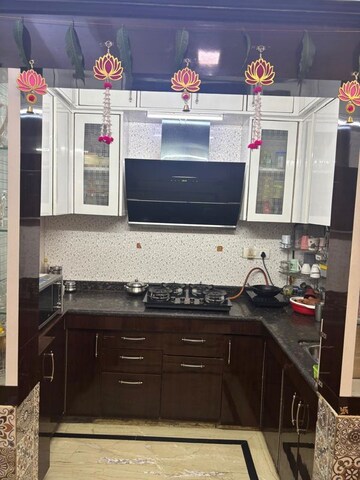 Kitchen in 3 BHK Builder Floor at Shakti Khand Iii – for Sale