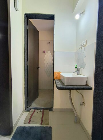 Bathroom in 1 BHK Apartment at Mantra Insignia, Mundhwa – for Rent