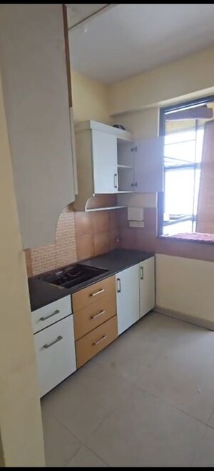 Kitchen in 2 BHK Apartment at Charms Solitaire Ghaziabad, Ahinsa Khand 2 – for Sale