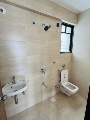 Bathroom in 2 BHK Apartment at Unique Youtopia, Kharadi – for Rent