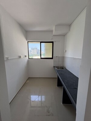 Kitchen in 1 BHK Apartment at Happy Valley, Manpada – for Sale