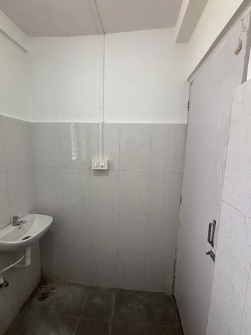 Bathroom in 1 BHK Apartment at Happy Valley, Manpada – for Sale