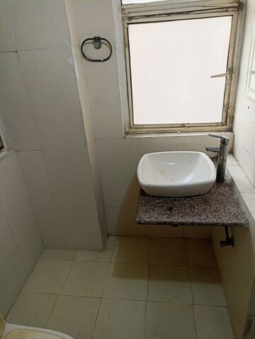 Bathroom in 2.5 BHK Apartment at Mahagun Manor, Sector 50 – for Rent