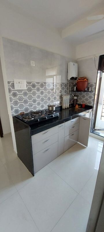 Kitchen in 2 BHK Apartment at Paras Dev Paradise Mira, Mira Road – for Rent