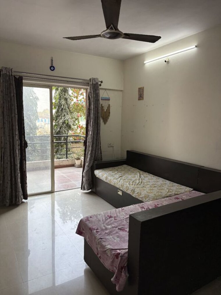 Bedroom, jalan-aura-county-pune 2 Bedroom 1078 Sq.Ft. Apartment In Wagholi Pune 9927712