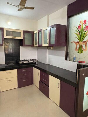 Kitchen in 2 BHK Apartment at Jalan Aura County Pune, Wagholi – for Rent