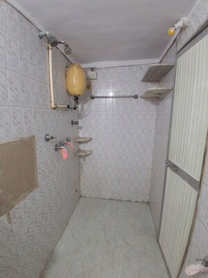Bathroom in 1 BHK Apartment at Ram Niwas CHS, Dahisar West – for Rent