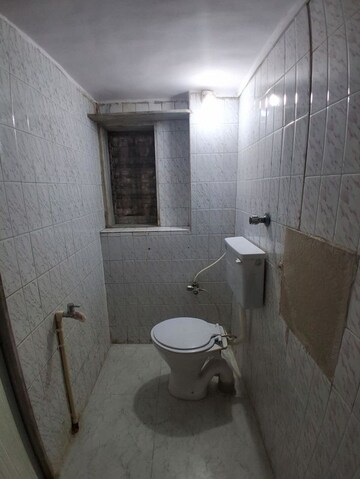 Bathroom in 1 BHK Apartment at Ram Niwas CHS, Dahisar West – for Rent