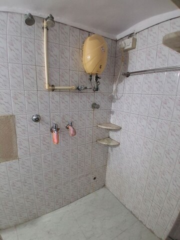Bathroom in 1 BHK Apartment at Ram Niwas CHS, Dahisar West – for Rent