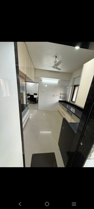 Kitchen in 4 BHK Apartment at Merlin Opal, C G Road – for Rent