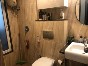 Bathroom in 1.5 BHK Apartment at Lodha Amara, Kolshet Road – for Rent