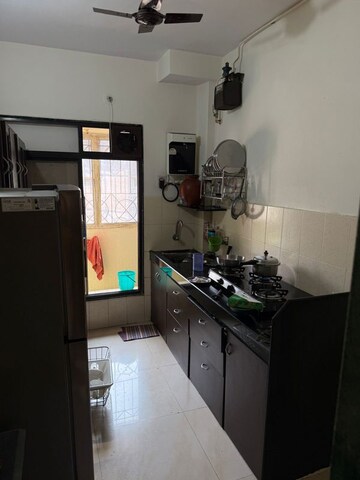 Kitchen in 3 BHK Apartment at Atul Trans Apartment, Andheri East – for Sale