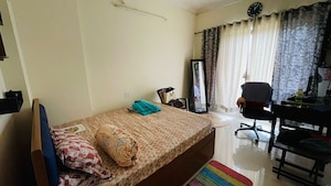 Bedroom in 2 BHK Apartment at K Raheja Heights, Malad East – for Rent