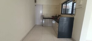 Kitchen in 2 BHK Apartment at Vijay Nagar CHS, Dhayari – for Rent
