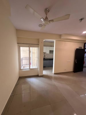 Room in 2 BHK Apartment at Ajnara Le Mart, Sector 16b Greater Noida – for Sale
