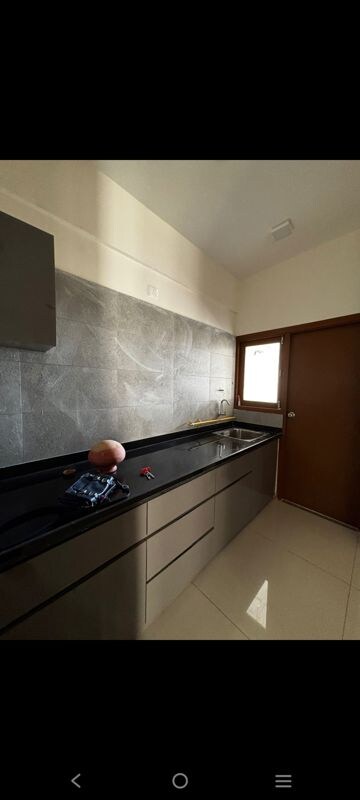 Kitchen in 2 BHK Apartment at Shagun Saral 207, Zundal – for Rent