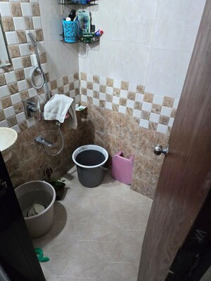 Bathroom in 1 BHK Apartment at Puranik Unicorn, Mogharpada – for Rent