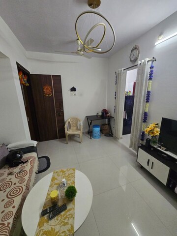 Living Room in 1 BHK Apartment at Puranik Unicorn, Mogharpada – for Rent